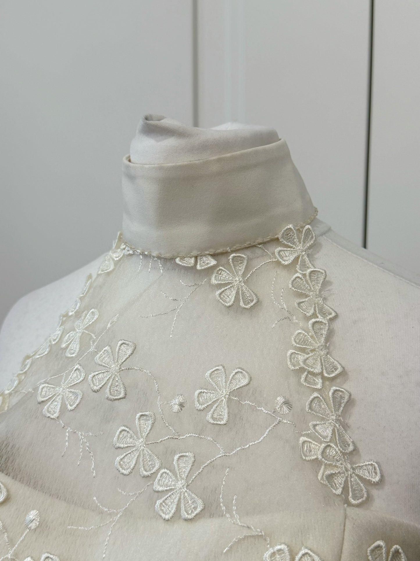Elegant Cream Wedding Dress with Floral Embroidery